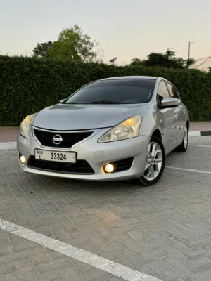 Nissan Tiida 2015. GCC specifications, original paint accident free excellent condition.