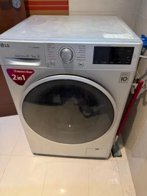 غسالة ومجفف ال جي (LG) أوتوماتيك 2 في 1 (محتاجة تبديل ربل)