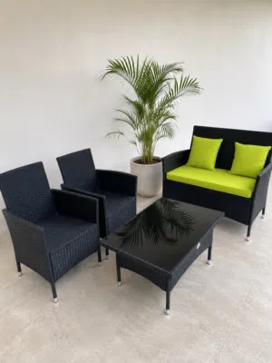 4-piece Outdoor Rattan Patio Sofa Set with Table and Cushions