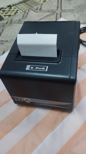 طابعة رول E pos لجميع محلات البيع والمشاريع والصيدليات بحالة ممتازه