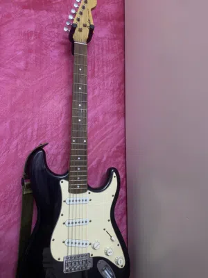 Fender Stratocaster - Black with Gold Anodized Pickguard