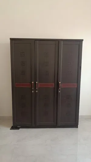 Spacious dark wooden 3 door wardrobe