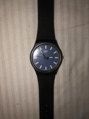 ساعة سواتش سويسرية أصلية Swatch Nightsea (GB281) - بحاجة لإبزيم حزام