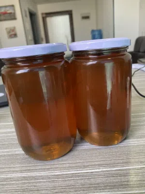 عسل اردني جبلي اصلي مفحوص ومكفول شامل التوصيل لكل مناطق عمان