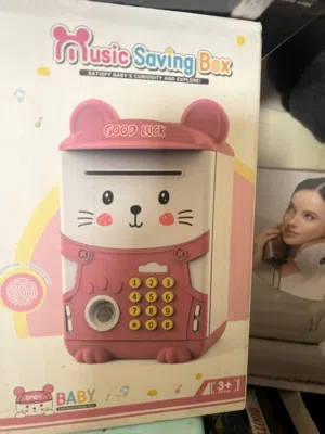 حصالة الأطفال الذكية صراف الي متنقل ب15 دينار على البصمة