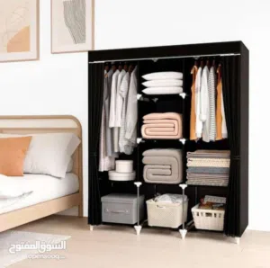 خزانة قماش مثالية لتخزين الملابس إطار المنتج مصنوع من معدن متين ومقاوم .