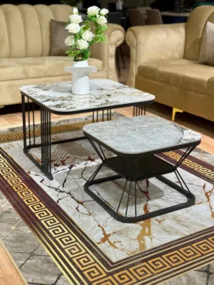 طاولات وسط متداخلة بتصميم رخامي فاخر ولمسات ذهبية ملكية سطح رخامي أنيق يعطي ديكور بيتك لمسة راقية