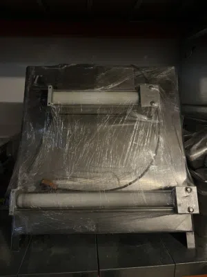 Pizza roller machine