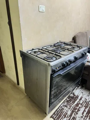 ثلاجه وفرن خمس عيون