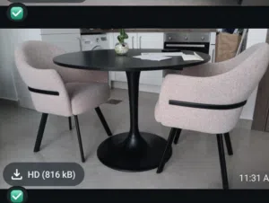two table chairs and one table