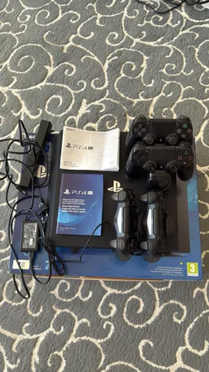 100% Original PlayStation 4 Pro 1TB Bundle – 4 Original Controllers + PlayStation Camera