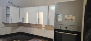 دولاب مطبخ حرف L فوق ولوطه