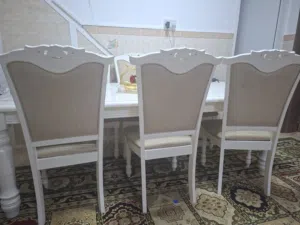 almost new table used with 8 chairs to king chairs and 6 normal chairs