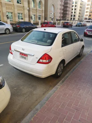 نيسان تيدا 2012 خليجي سيدان ابيض لؤلؤي