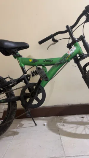 Bicycle jeep green  Like new  Two wheels