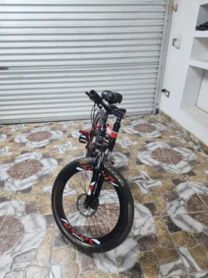 (Red) AOWM  mountain bike, 7 gears, (NO DELIVERY, MUST COME TO MY PLACE, DIYAR AL MUHARRAQ,)