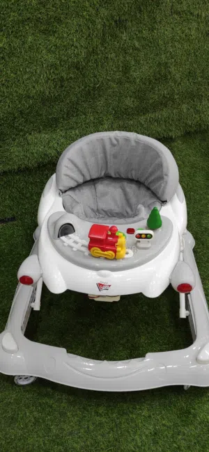 كراجه عرباية مشي للأطفال - مريحة وآمنة!   التصميم: عربة مشي أنيقة باللونين والوردي والابيض والسكني