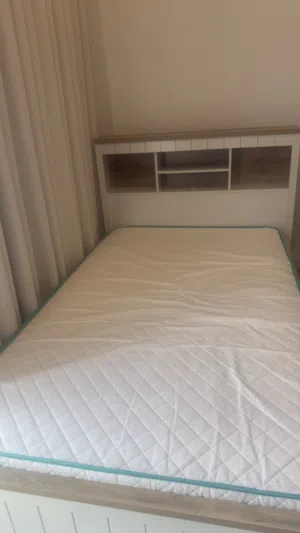 New bed frame with a mattress