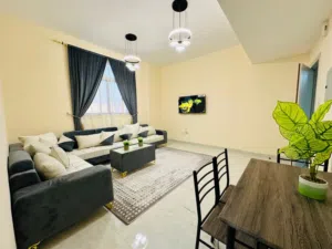 z9 غرفه وصاله مفروش-اثاث جديد بالنعيميه مقابل سنتر الحوت وقريب من شارع الكويت ومخرج دبي 4200 شامل