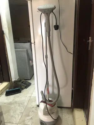 مكوة ملابس افقية