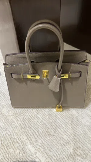 شنطة هرمز بنية حلوه