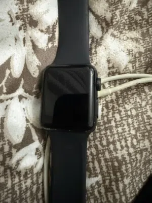 Model: Appears to be the Apple Watch Series 3, often found in space gray or black aluminum finishes