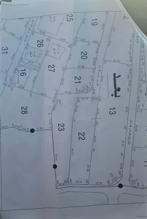 قطعة ارض مربعة الشكل في قوصين