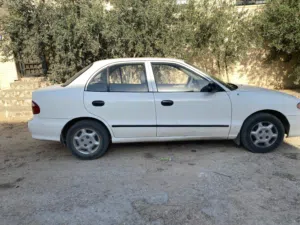 هونداي اكسنت موديل 97 اتوماتيك لون ابيض فيها 3 جيد ترخيص 6شهور سنتر مكيف ودفاية
