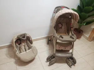 عرباية اطفال وكرسي اطفال ماركه بحالة الجديد