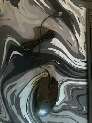 ماوس جديد بقراطيسه