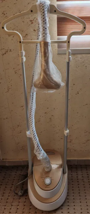 مكواة ملابس بخار عامودية