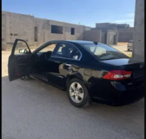 كيا اوبتيما 2009/2010 للبيع ماشيه 280 محرك 20 عيب بسيط المكيف مش شغال وتس
