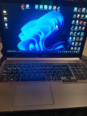 لابتوب Fujitsu ( للبيع او مراوس مع حاسبة دسكتوب مستعمل نظيف جداً - للدراسة والعمل والألعاب الخفيفة.