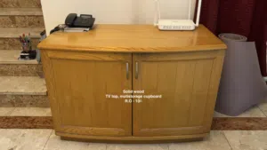 Expat Living - TV stand with storage shelf