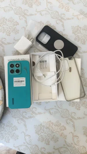 هونر x8c بحالة الجديد استخدام خفيف جدا مع كامل أغراضه 256 جيجا 16 رام بطارية 5000 شاحن سريع 35w شاشة