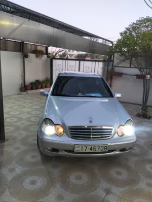 مرسيدس C200 موديل2001 كت اصلي AMG اعلئ مواصفات افنجارد فحص 3 جيد ومضروب بنكيت