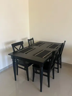 Table with 4 chairs in good condition