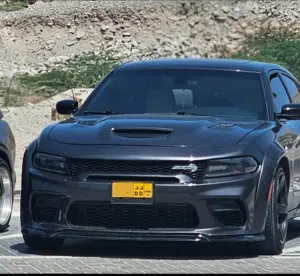 Dodge Charger, extremely well-maintained and in excellent condition.