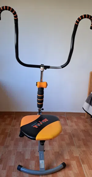 Ab Doer Twist A seated exercise machine designed to work your core (abs, obliques, lower back) with