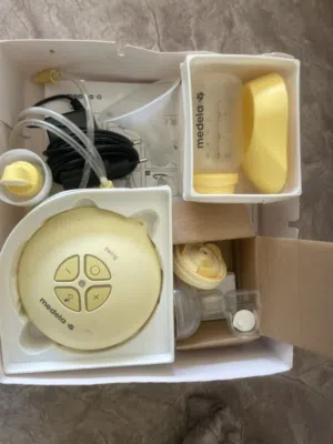 Medela Swing Single Electric Breast    شفاط حليب ميديلاPump  عبوات حفظ الحليب cooler bag و
