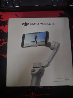 بكج تصوير احترافي شبه وكالة (DJI Osmo Mobile SE + مايك Boya)