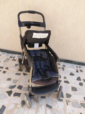 عربة أطفال بكرسيين