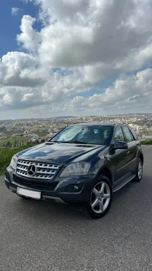 مرسيدس بنز ML350 4MATIC AMG Kit 2011 (ترخيص وتأمين شامل جديد)