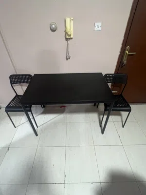 IKEA dining table with 2 chairs for sale