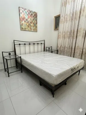 Bed, mattress, bedside tables & dresser w/ chair