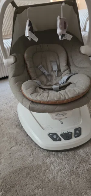 Electricity grey bedside bassinet/crib with storage shelf — gently used