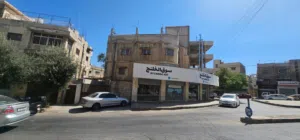 بناية تجارية و سكنية للبيع في جبل النزهة بسعر شقة