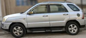 كيا سبورتج موديل 2009 ( تسعة عشرة ) اربع سلندر مكينة 2000  فضي