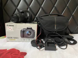 Canon EOS DSLR 1200D Camera with box and accessories barely used