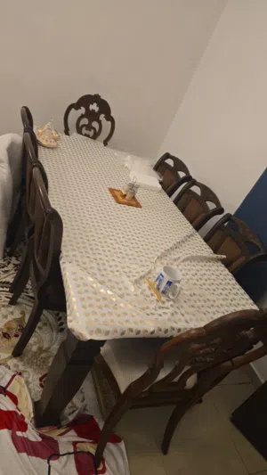big dining table with 8 chairs.